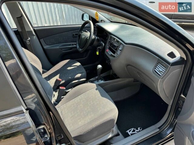 Чорний Кіа Ріо, об'ємом двигуна 1.4 л та пробігом 180 тис. км за 5999 $, фото 10 на Automoto.ua
