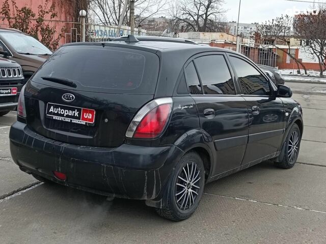Черный Киа Рио, объемом двигателя 1.4 л и пробегом 274 тыс. км за 5290 $, фото 8 на Automoto.ua