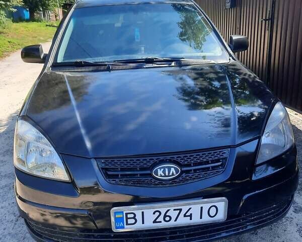 Черный Киа Рио, объемом двигателя 1.4 л и пробегом 390 тыс. км за 3500 $, фото 6 на Automoto.ua