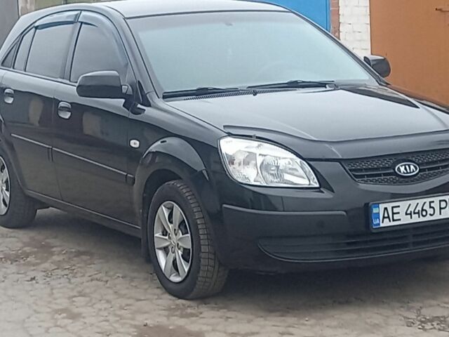 Чорний Кіа Ріо, об'ємом двигуна 1.4 л та пробігом 125 тис. км за 5900 $, фото 7 на Automoto.ua