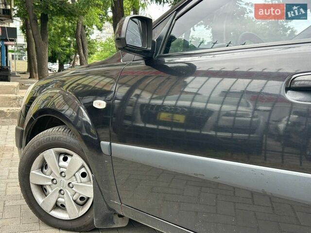 Чорний Кіа Ріо, об'ємом двигуна 1.4 л та пробігом 260 тис. км за 4800 $, фото 9 на Automoto.ua