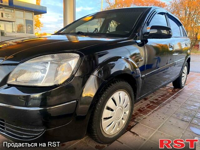 Чорний Кіа Ріо, об'ємом двигуна 1.4 л та пробігом 160 тис. км за 3900 $, фото 1 на Automoto.ua