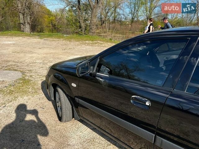 Черный Киа Рио, объемом двигателя 1.4 л и пробегом 103 тыс. км за 3400 $, фото 5 на Automoto.ua