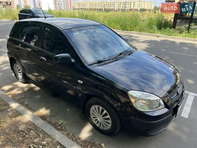 Черный Киа Рио, объемом двигателя 1.4 л и пробегом 193 тыс. км за 5800 $, фото 5 на Automoto.ua