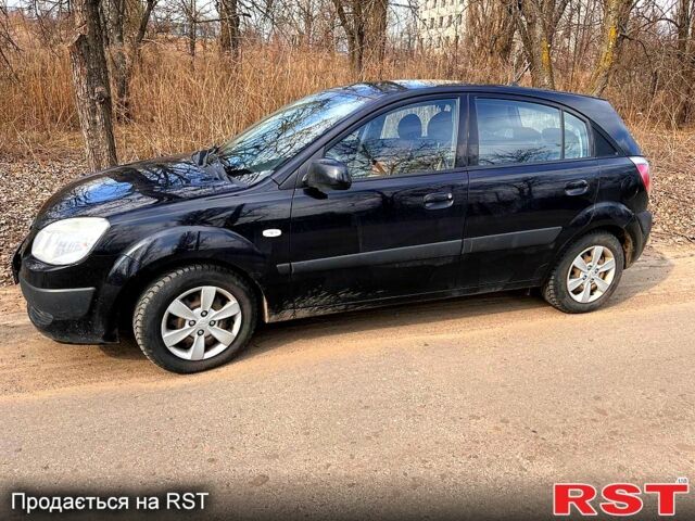 Чорний Кіа Ріо, об'ємом двигуна 1.4 л та пробігом 194 тис. км за 4500 $, фото 6 на Automoto.ua