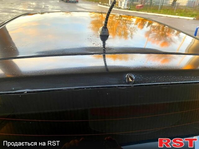 Чорний Кіа Ріо, об'ємом двигуна 1.4 л та пробігом 160 тис. км за 3900 $, фото 5 на Automoto.ua