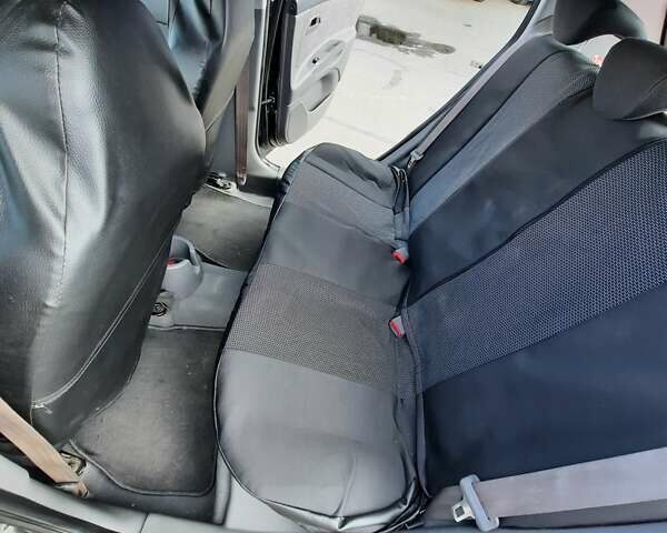Черный Киа Рио, объемом двигателя 1.4 л и пробегом 222 тыс. км за 4100 $, фото 9 на Automoto.ua