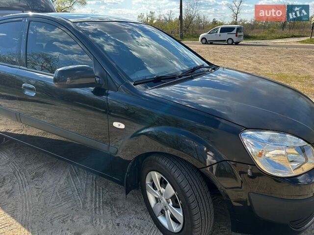 Черный Киа Рио, объемом двигателя 1.4 л и пробегом 103 тыс. км за 3400 $, фото 6 на Automoto.ua
