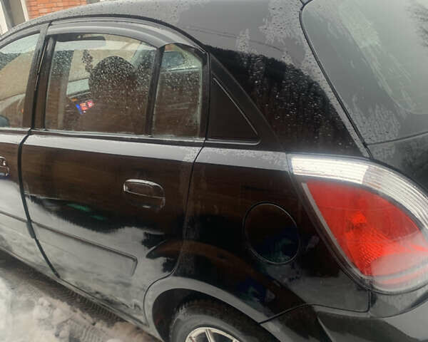 Черный Киа Рио, объемом двигателя 1.4 л и пробегом 86 тыс. км за 5300 $, фото 4 на Automoto.ua