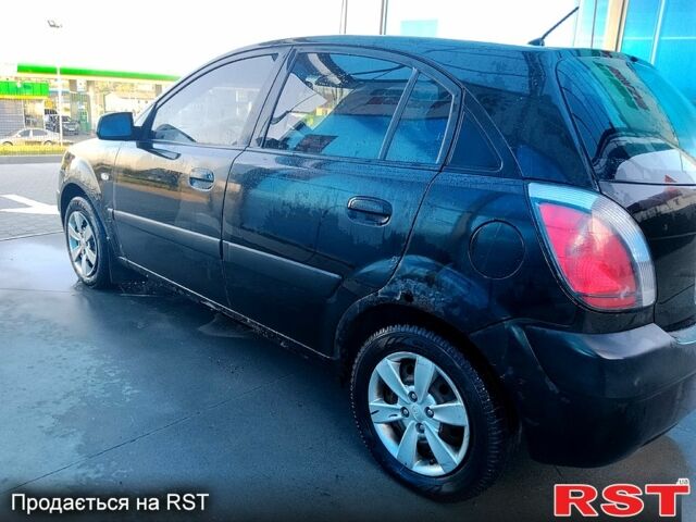 Черный Киа Рио, объемом двигателя 1.4 л и пробегом 349 тыс. км за 2599 $, фото 7 на Automoto.ua