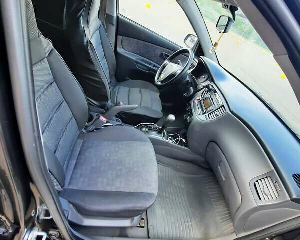 Черный Киа Рио, объемом двигателя 1.4 л и пробегом 222 тыс. км за 4100 $, фото 10 на Automoto.ua