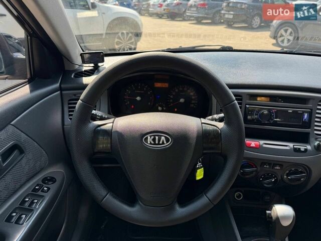 Чорний Кіа Ріо, об'ємом двигуна 1.4 л та пробігом 180 тис. км за 5999 $, фото 7 на Automoto.ua