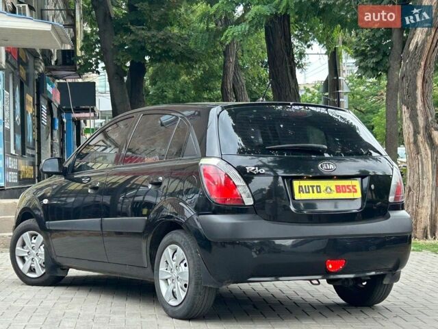 Чорний Кіа Ріо, об'ємом двигуна 1.4 л та пробігом 260 тис. км за 4800 $, фото 6 на Automoto.ua