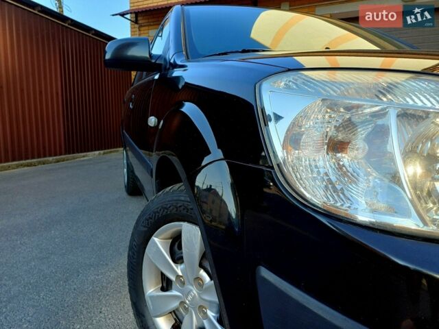 Черный Киа Рио, объемом двигателя 1.4 л и пробегом 212 тыс. км за 4400 $, фото 2 на Automoto.ua