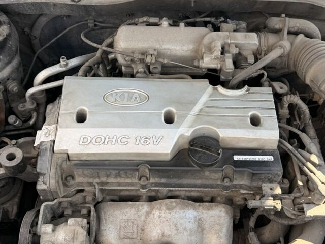 Чорний Кіа Ріо, об'ємом двигуна 1.4 л та пробігом 260 тис. км за 4600 $, фото 12 на Automoto.ua