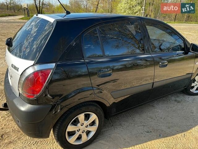 Черный Киа Рио, объемом двигателя 1.4 л и пробегом 103 тыс. км за 3400 $, фото 3 на Automoto.ua