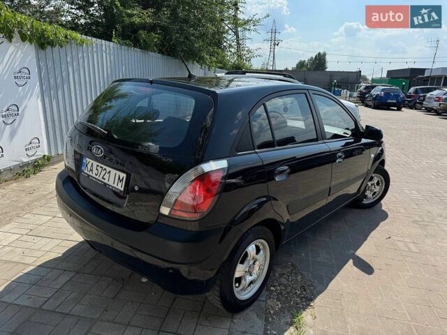 Чорний Кіа Ріо, об'ємом двигуна 1.4 л та пробігом 180 тис. км за 5999 $, фото 2 на Automoto.ua