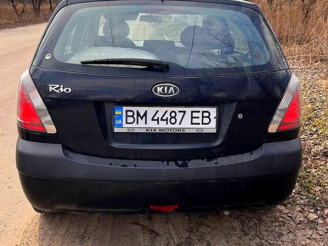 Чорний Кіа Ріо, об'ємом двигуна 1.4 л та пробігом 194 тис. км за 4500 $, фото 1 на Automoto.ua