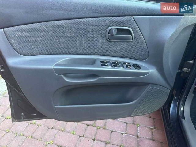 Черный Киа Рио, объемом двигателя 1.4 л и пробегом 102 тыс. км за 4499 $, фото 25 на Automoto.ua