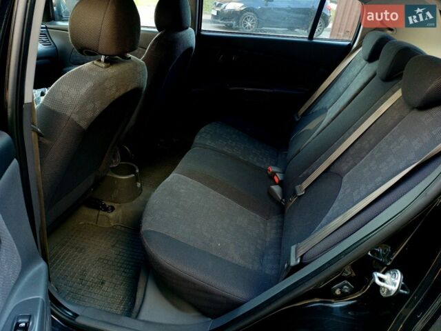 Черный Киа Рио, объемом двигателя 1.4 л и пробегом 212 тыс. км за 4400 $, фото 15 на Automoto.ua