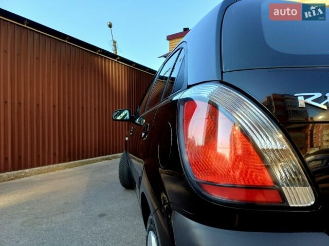 Черный Киа Рио, объемом двигателя 1.4 л и пробегом 212 тыс. км за 4400 $, фото 7 на Automoto.ua
