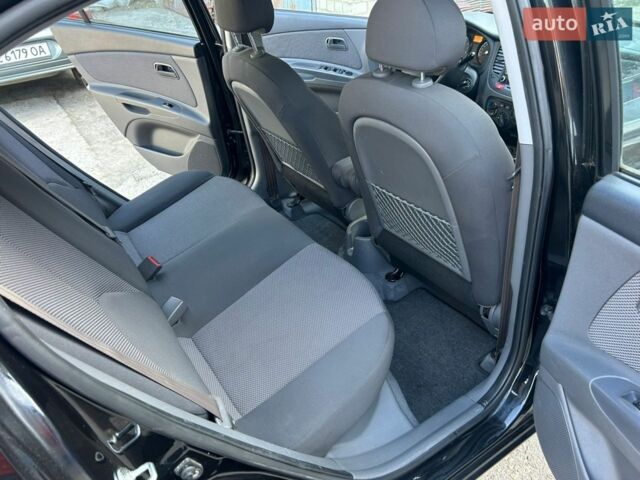 Черный Киа Рио, объемом двигателя 1.4 л и пробегом 167 тыс. км за 5200 $, фото 9 на Automoto.ua