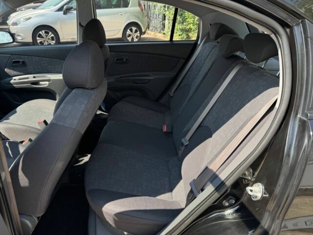Черный Киа Рио, объемом двигателя 1.4 л и пробегом 160 тыс. км за 5993 $, фото 14 на Automoto.ua