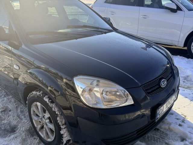 Чорний Кіа Ріо, об'ємом двигуна 1.4 л та пробігом 208 тис. км за 6200 $, фото 1 на Automoto.ua
