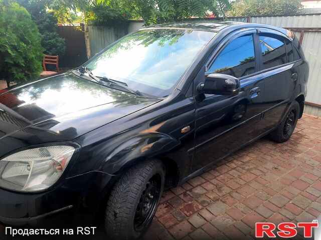 Черный Киа Рио, объемом двигателя 1.4 л и пробегом 392 тыс. км за 3700 $, фото 2 на Automoto.ua