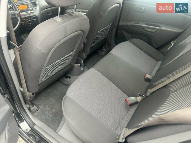 Чорний Кіа Ріо, об'ємом двигуна 1.4 л та пробігом 166 тис. км за 5450 $, фото 9 на Automoto.ua