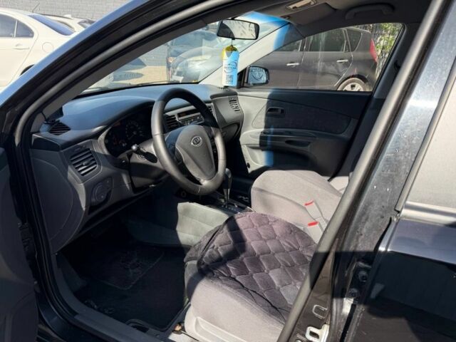 Чорний Кіа Ріо, об'ємом двигуна 1.4 л та пробігом 160 тис. км за 5494 $, фото 6 на Automoto.ua
