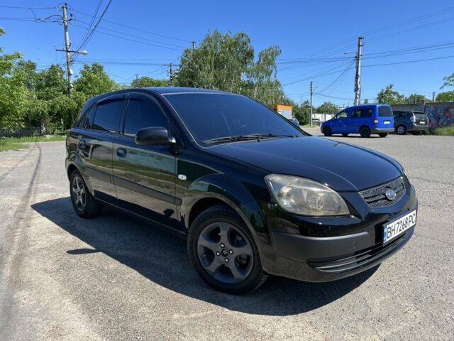 Черный Киа Рио, объемом двигателя 1.4 л и пробегом 240 тыс. км за 5200 $, фото 1 на Automoto.ua