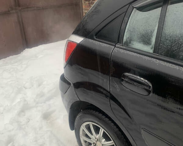 Черный Киа Рио, объемом двигателя 1.4 л и пробегом 86 тыс. км за 5300 $, фото 2 на Automoto.ua