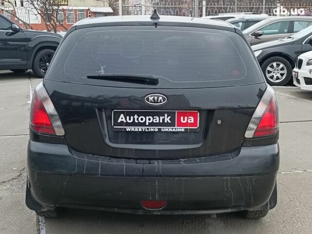 Черный Киа Рио, объемом двигателя 1.4 л и пробегом 274 тыс. км за 5290 $, фото 5 на Automoto.ua