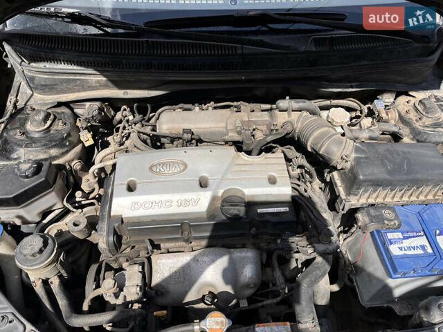 Черный Киа Рио, объемом двигателя 1.4 л и пробегом 174 тыс. км за 4200 $, фото 33 на Automoto.ua
