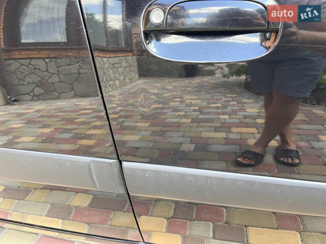 Черный Киа Рио, объемом двигателя 1.4 л и пробегом 174 тыс. км за 4200 $, фото 14 на Automoto.ua