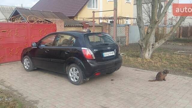 Черный Киа Рио, объемом двигателя 1.4 л и пробегом 180 тыс. км за 6000 $, фото 1 на Automoto.ua