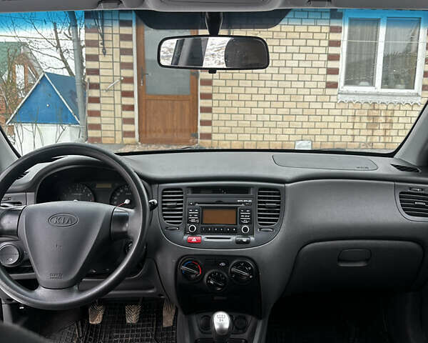 Чорний Кіа Ріо, об'ємом двигуна 1.4 л та пробігом 220 тис. км за 4400 $, фото 11 на Automoto.ua
