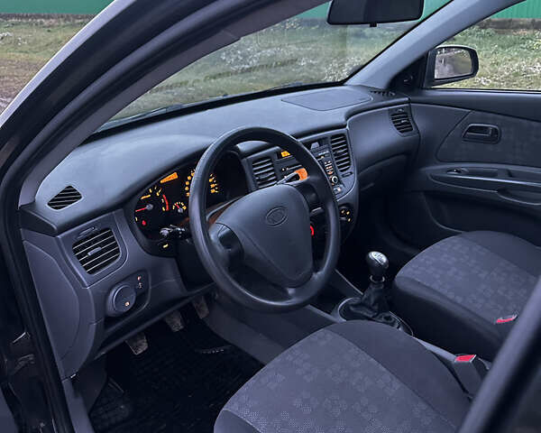 Черный Киа Рио, объемом двигателя 1.4 л и пробегом 220 тыс. км за 4499 $, фото 18 на Automoto.ua