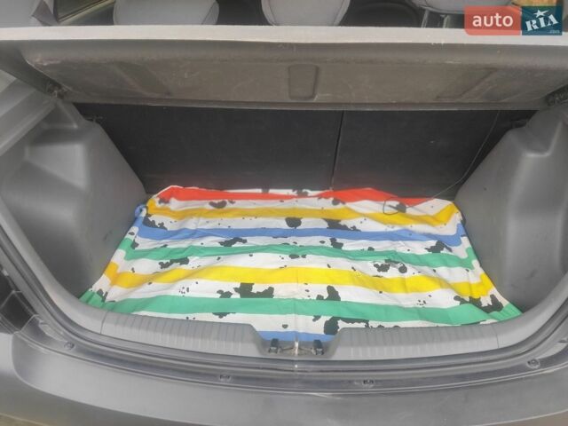 Черный Киа Рио, объемом двигателя 1.4 л и пробегом 260 тыс. км за 3450 $, фото 9 на Automoto.ua