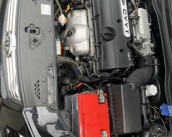 Чорний Кіа Ріо, об'ємом двигуна 1.6 л та пробігом 228 тис. км за 7400 $, фото 24 на Automoto.ua