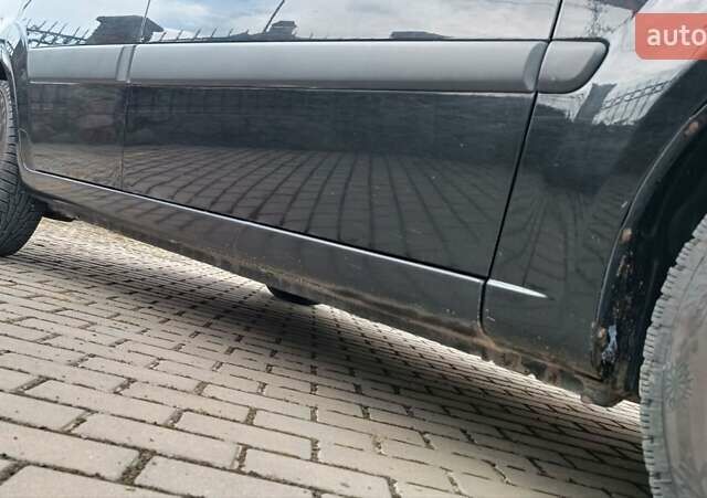 Чорний Кіа Ріо, об'ємом двигуна 1.4 л та пробігом 181 тис. км за 3850 $, фото 28 на Automoto.ua