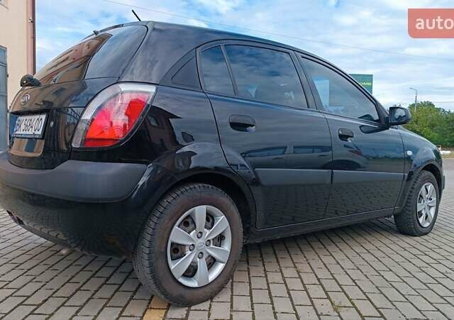 Чорний Кіа Ріо, об'ємом двигуна 1.4 л та пробігом 181 тис. км за 3850 $, фото 15 на Automoto.ua