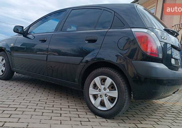 Чорний Кіа Ріо, об'ємом двигуна 1.4 л та пробігом 181 тис. км за 3850 $, фото 22 на Automoto.ua