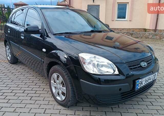 Чорний Кіа Ріо, об'ємом двигуна 1.4 л та пробігом 181 тис. км за 3850 $, фото 29 на Automoto.ua