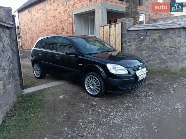 Черный Киа Рио, объемом двигателя 1.4 л и пробегом 201 тыс. км за 4699 $, фото 2 на Automoto.ua