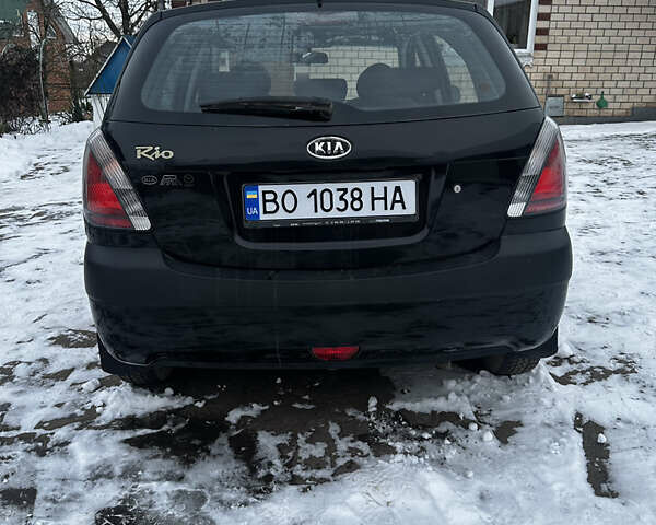 Чорний Кіа Ріо, об'ємом двигуна 1.4 л та пробігом 220 тис. км за 4400 $, фото 7 на Automoto.ua