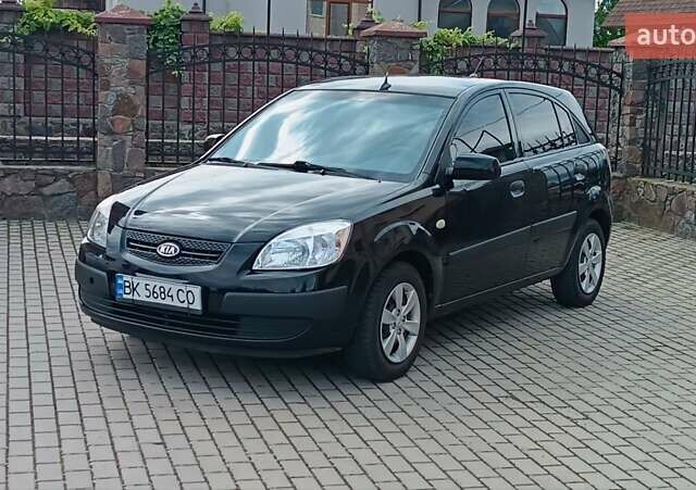 Чорний Кіа Ріо, об'ємом двигуна 1.4 л та пробігом 181 тис. км за 3850 $, фото 8 на Automoto.ua