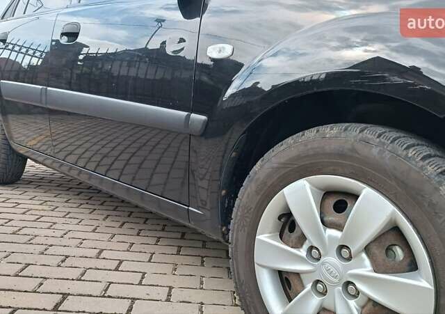 Чорний Кіа Ріо, об'ємом двигуна 1.4 л та пробігом 181 тис. км за 3850 $, фото 30 на Automoto.ua