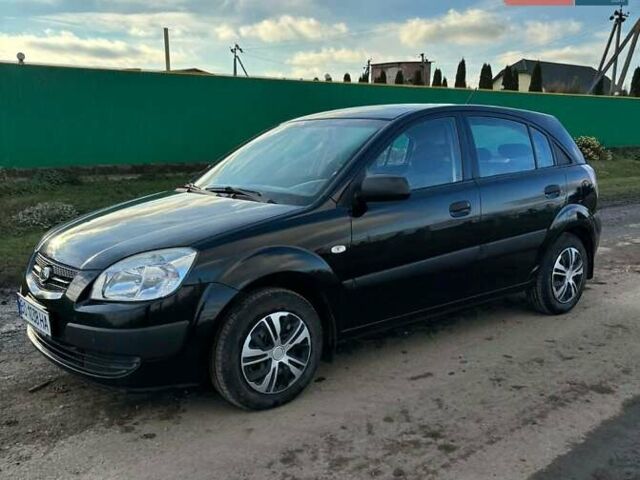 Черный Киа Рио, объемом двигателя 1.4 л и пробегом 220 тыс. км за 4399 $, фото 5 на Automoto.ua